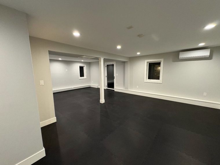 Open-plan basement, column wrap and trim