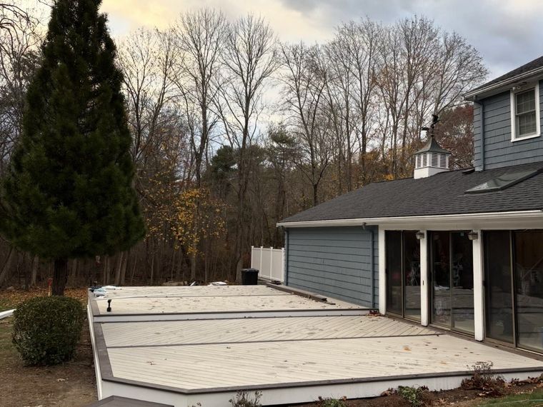 Low-profile composite deck with picture framing